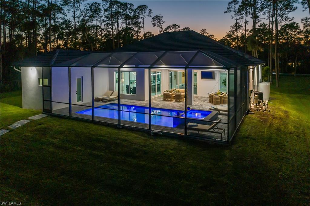 788 9th Street Southwest Naples, FL 34117 - Photo 6 of 46 a view of outdoor space with garden