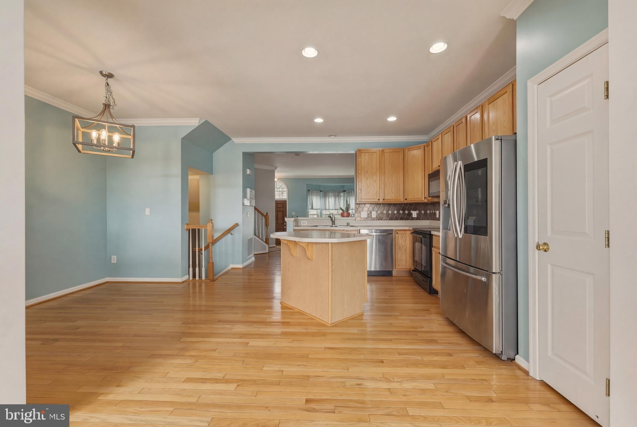 148 Riparian Lane Ranson, WV 25438 - Photo 13 of 41 Spacious kitchen with modern finishes.