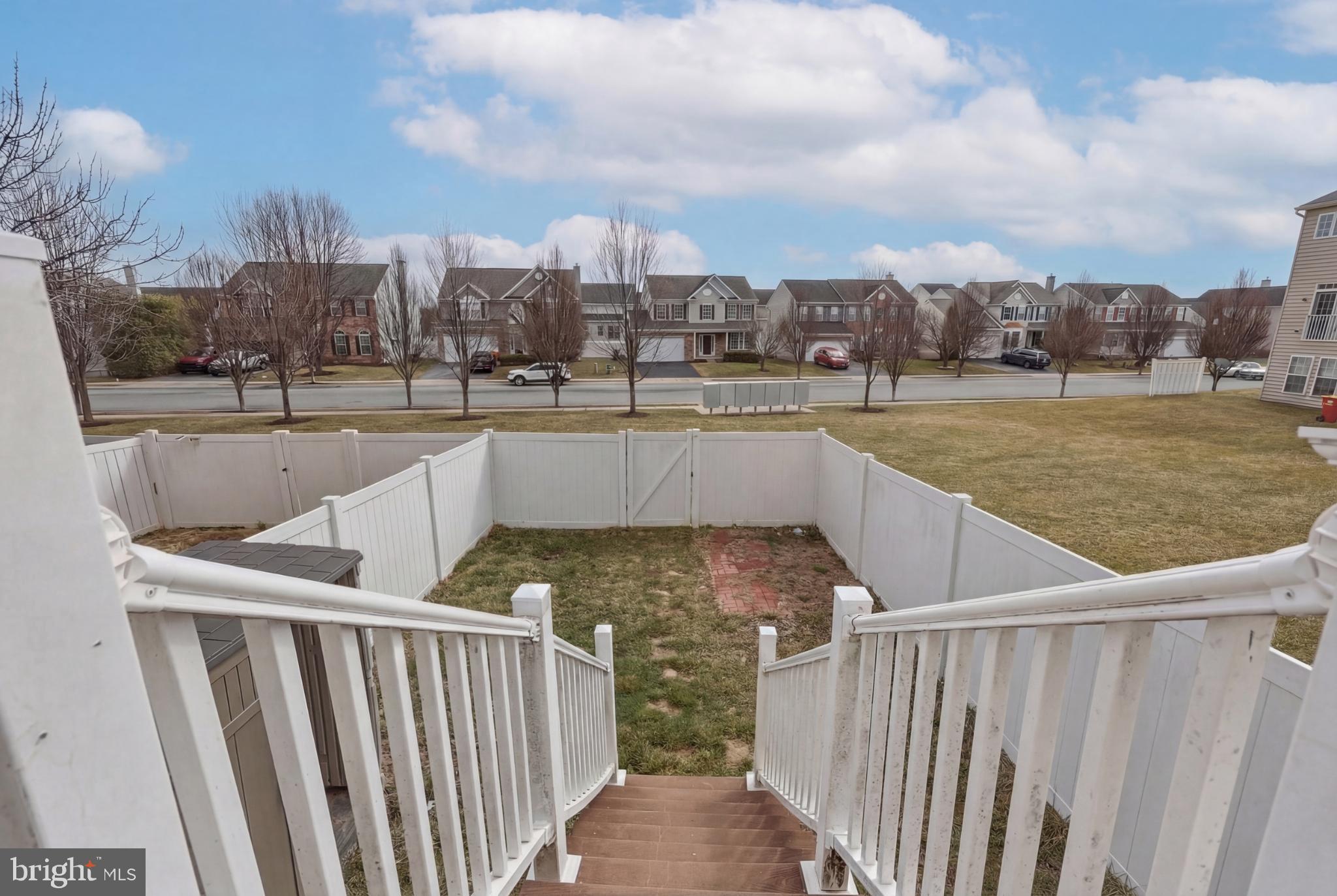 148 Riparian Lane Ranson, WV 25438 - Photo 20 of 41 Charming backyard retreat with serene views.