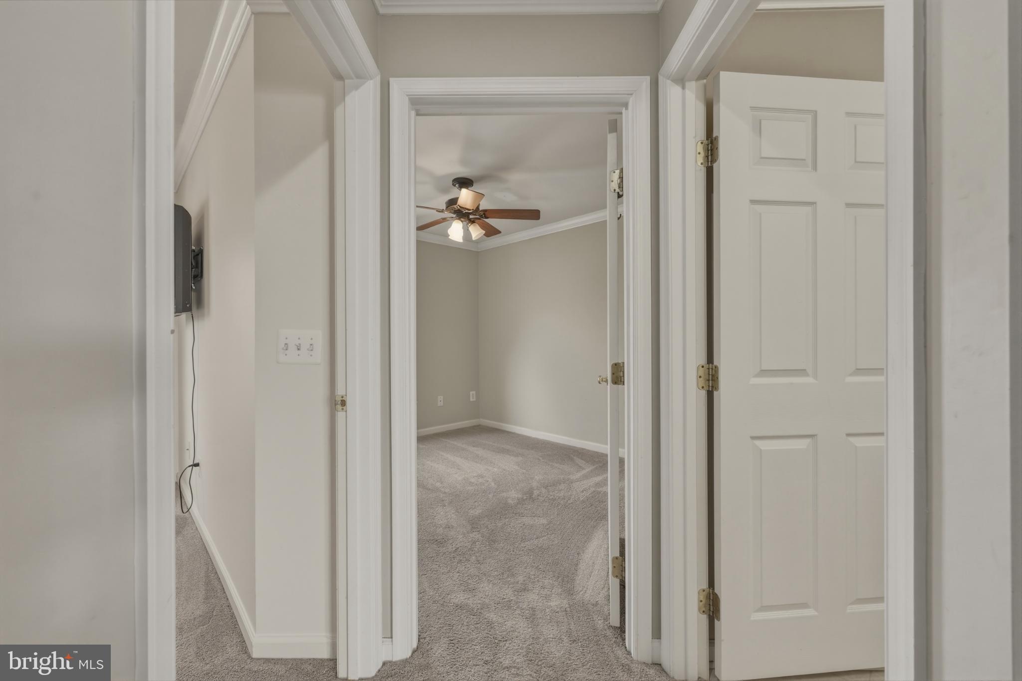 148 Riparian Lane Ranson, WV 25438 - Photo 21 of 41 Inviting hallway leading to cozy rooms.