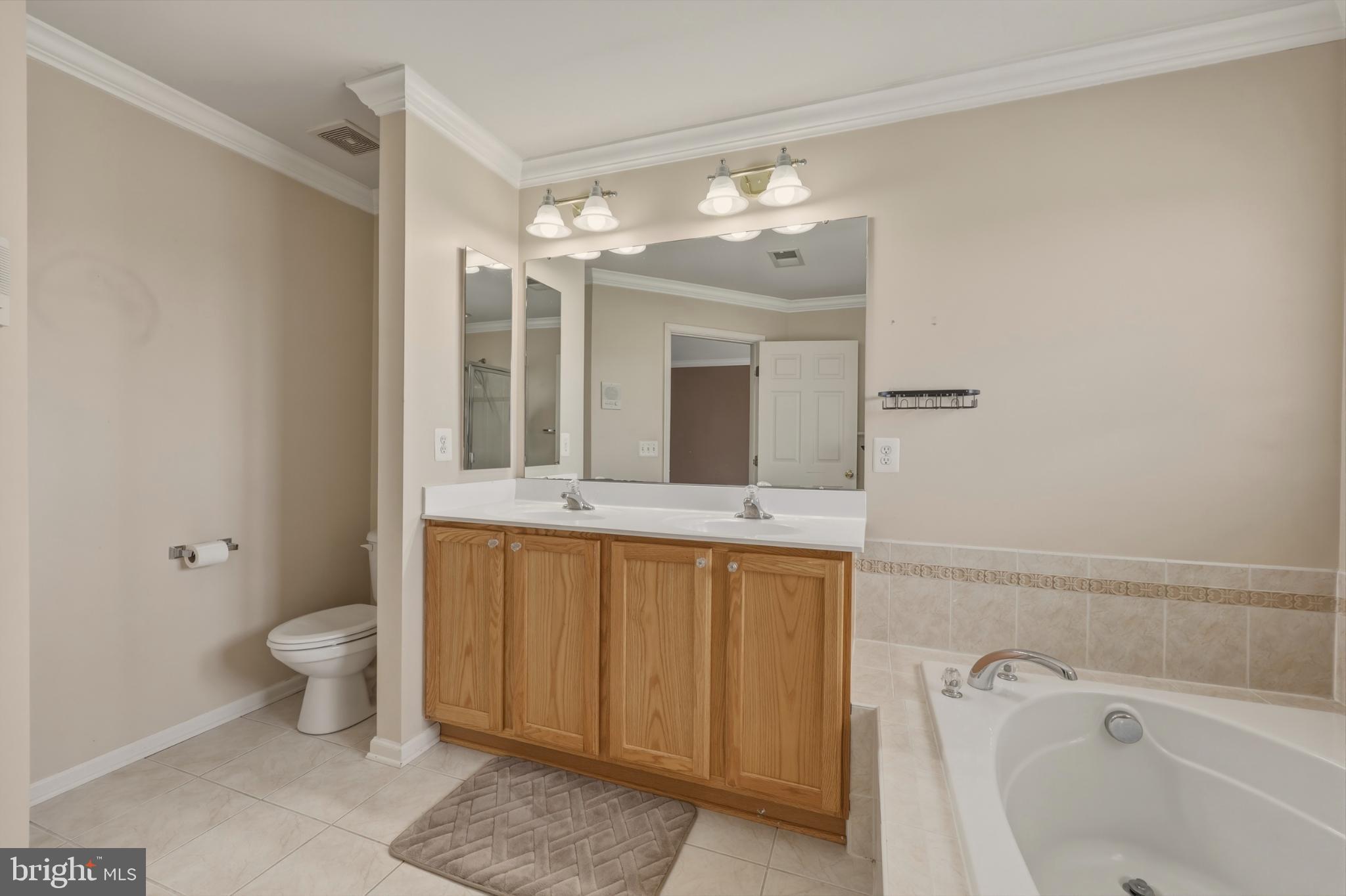 148 Riparian Lane Ranson, WV 25438 - Photo 28 of 41 Spacious, serene bathroom retreat.