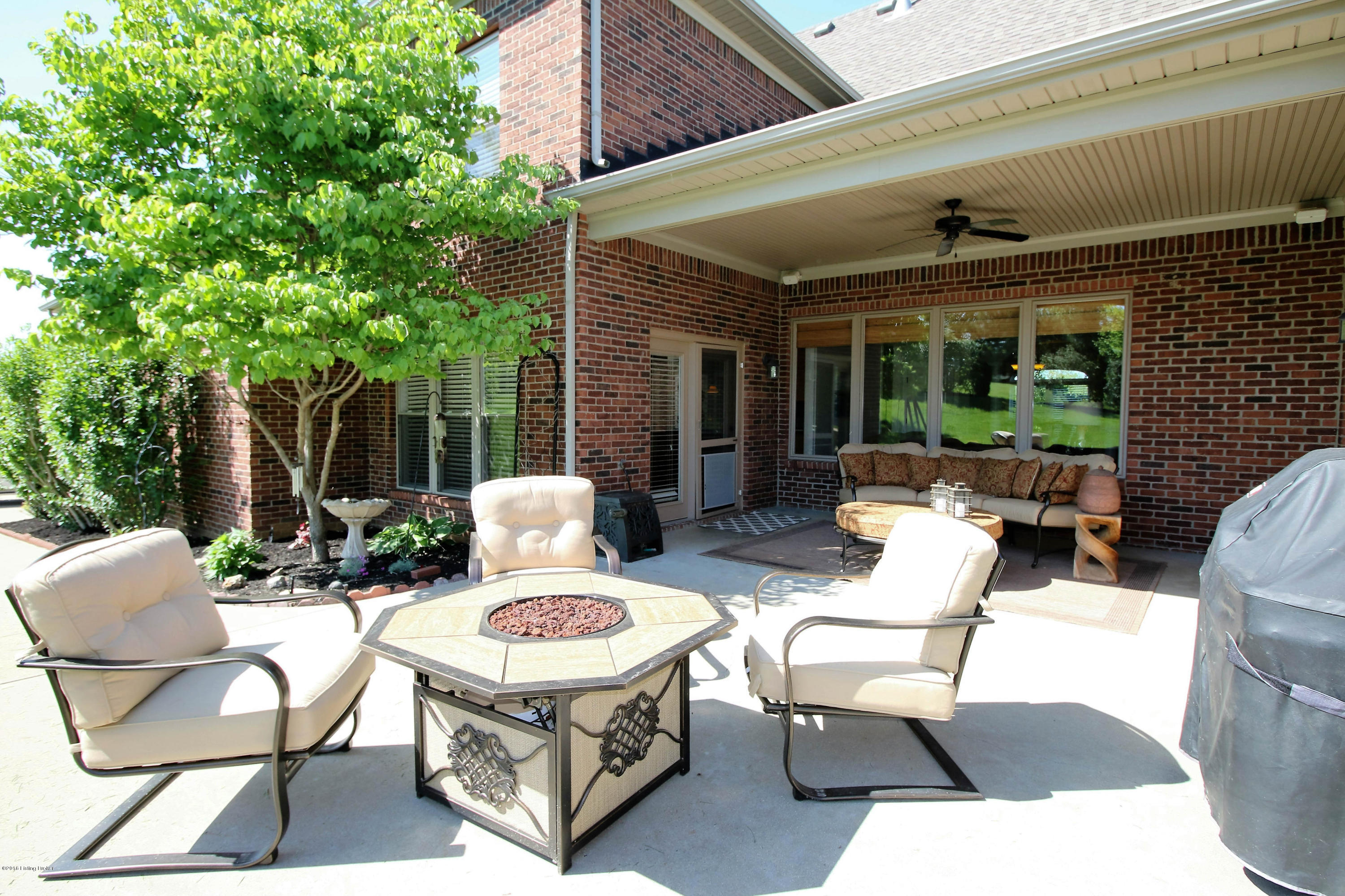 2904 Doe Ridge Court Prospect, KY 40059 - Photo 33 of 86 Enjoy the serene outdoor space from your covered patio, accessed from both the master suite and the kitchen.