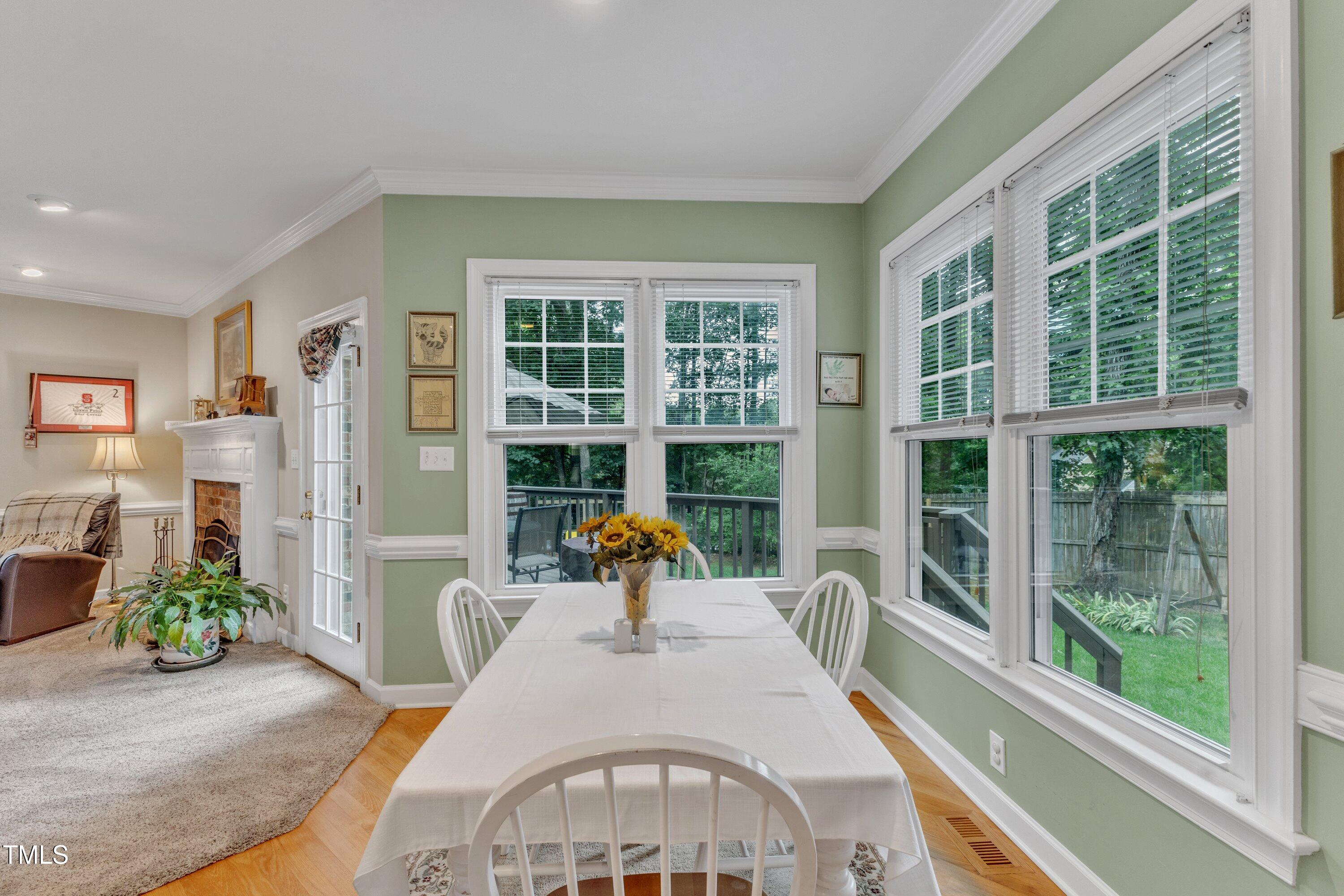 7613 Percy Court Raleigh, NC 27613 - Photo 19 of 51 a bedroom with furniture and windows