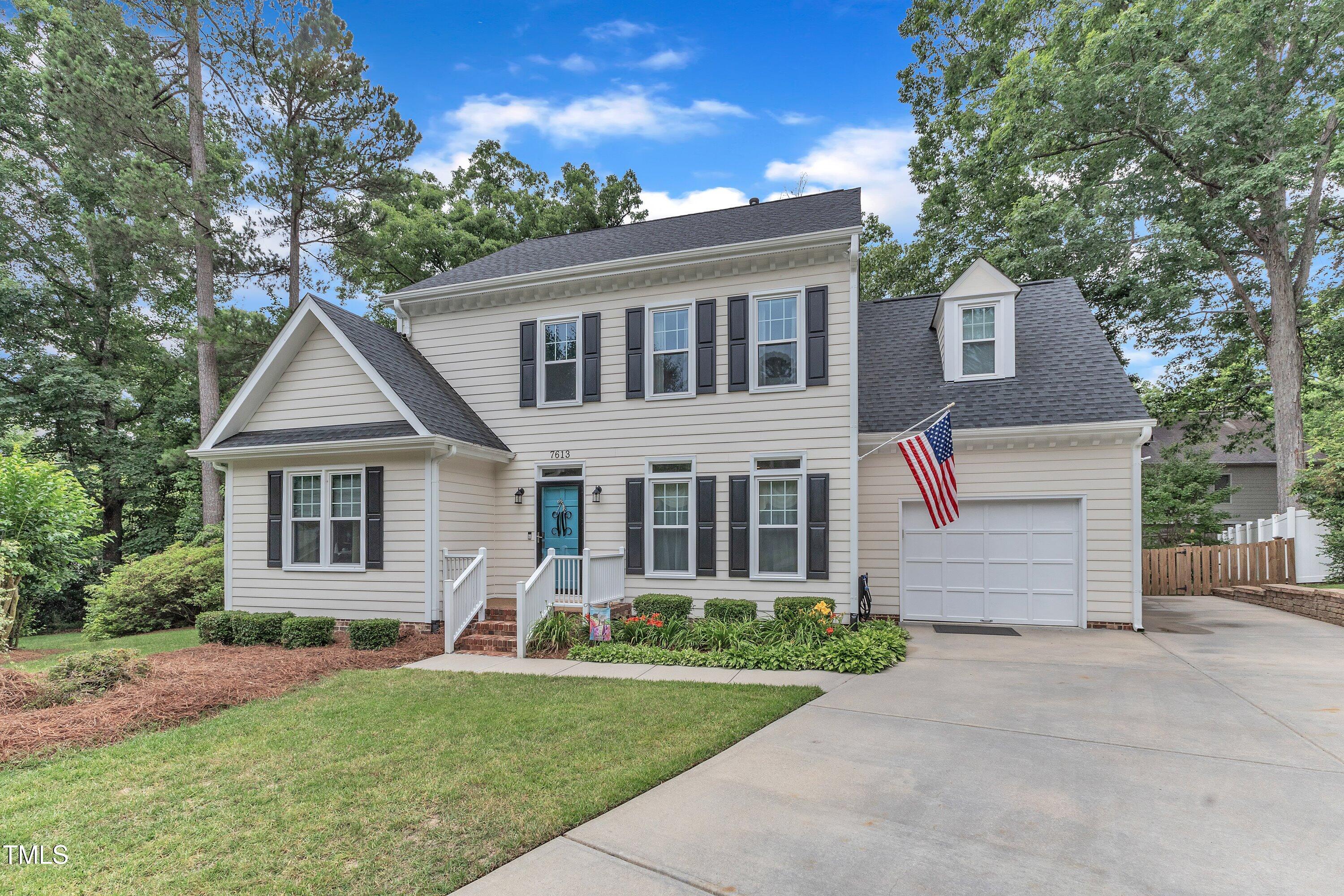 7613 Percy Court Raleigh, NC 27613 - Photo 2 of 51 front view of a house with a yard
