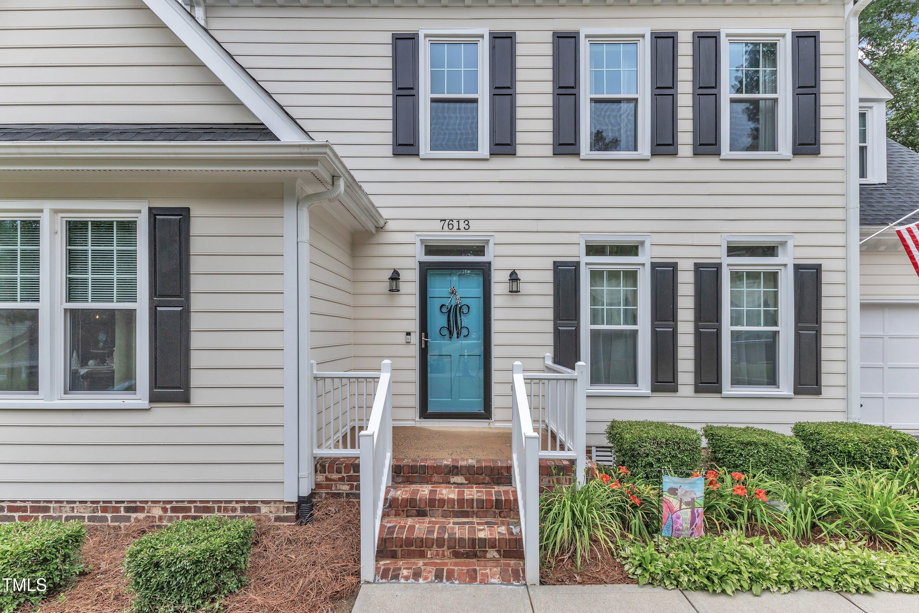 7613 Percy Court Raleigh, NC 27613 - Photo 3 of 51 a view of a house with potted plants