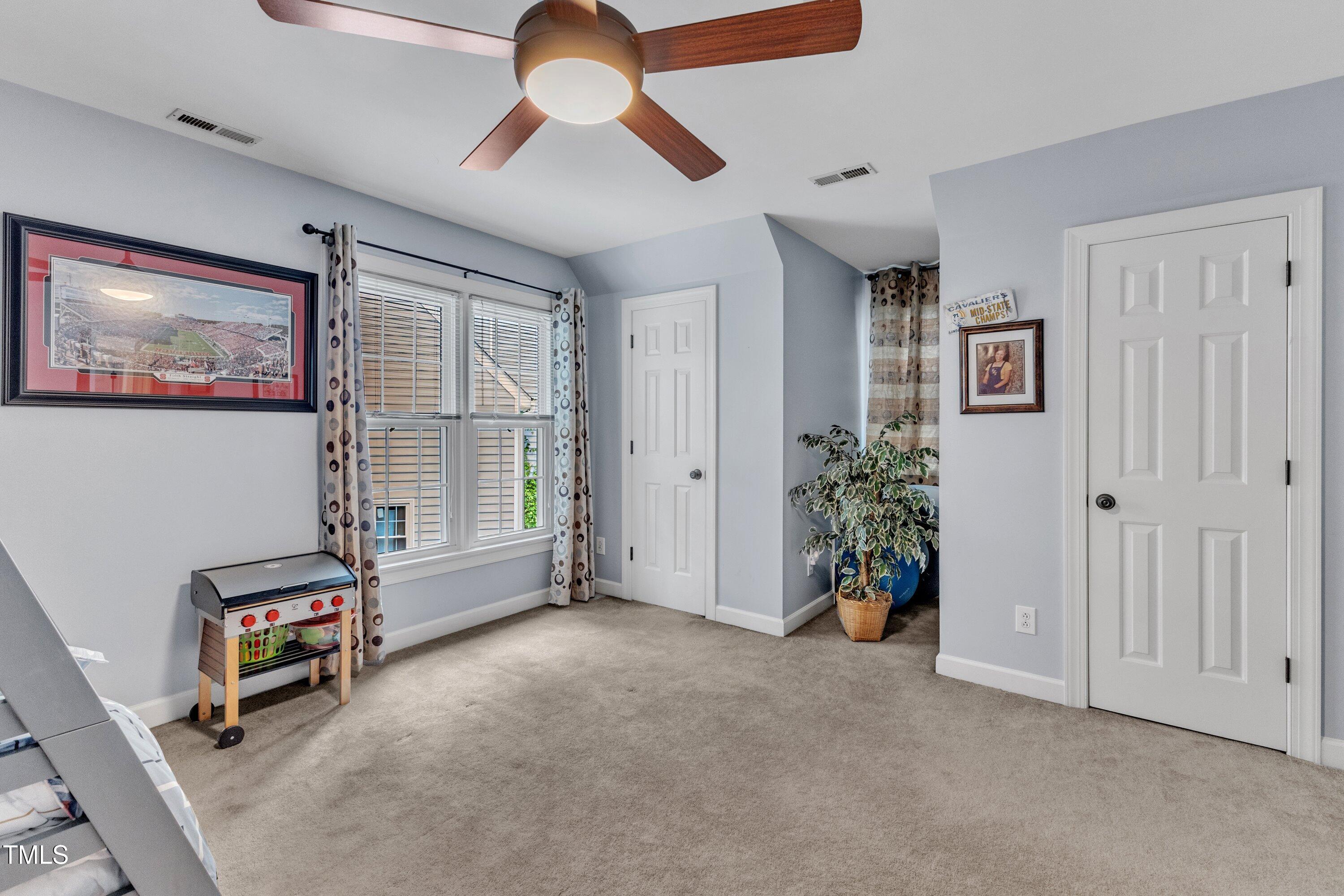 7613 Percy Court Raleigh, NC 27613 - Photo 42 of 51 a view of an empty room with a window