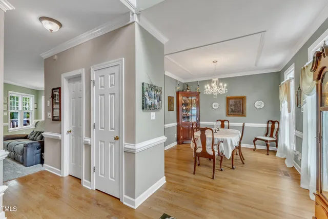 a view of a livingroom with furniture and wooden floor