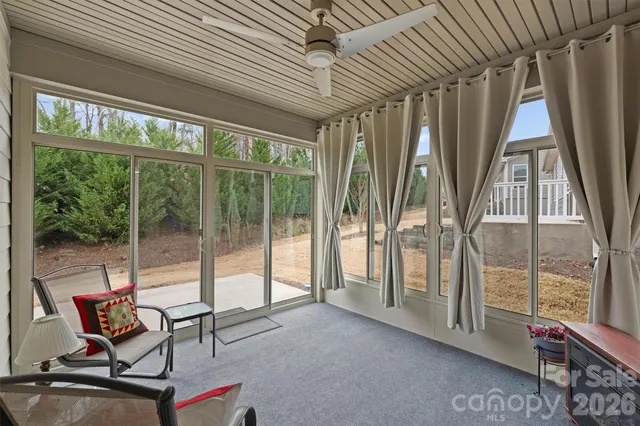 a view of room with window and furniture