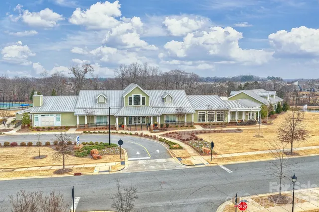 a view of swimming pool with furniture