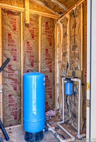an aerial view of a house with outdoor space