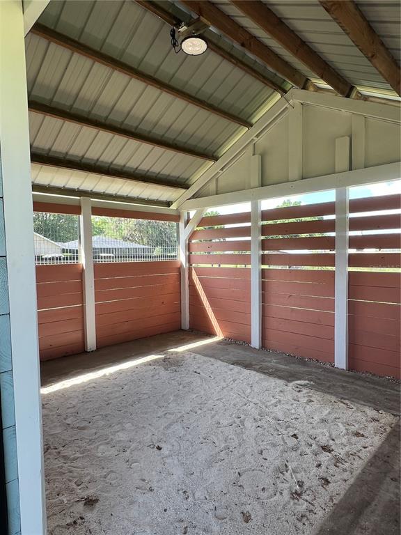 1575 Northeast 100th Street Anthony, FL 32617 - Photo 11 of 29 a view of empty room with wooden walls