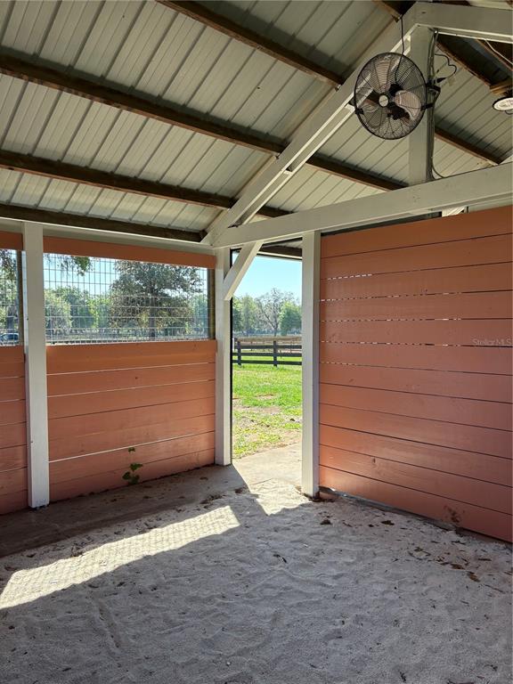 1575 Northeast 100th Street Anthony, FL 32617 - Photo 12 of 29 a view of a room with wooden floor and roof