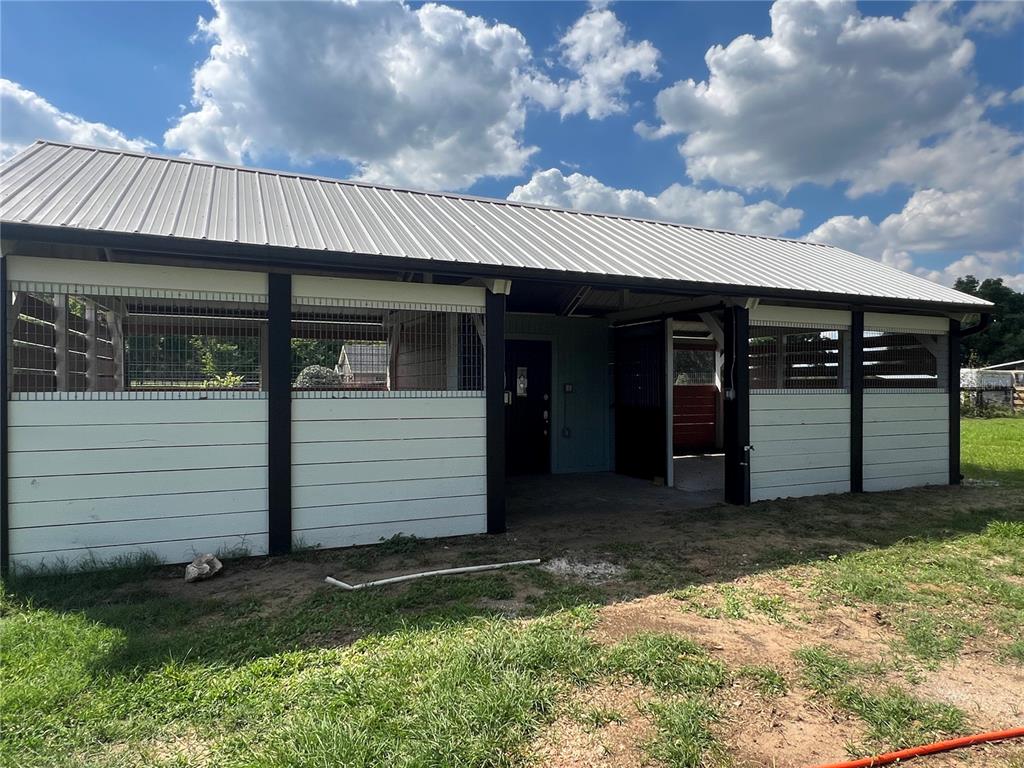 1575 Northeast 100th Street Anthony, FL 32617 - Photo 2 of 29 a view of a house with a garage
