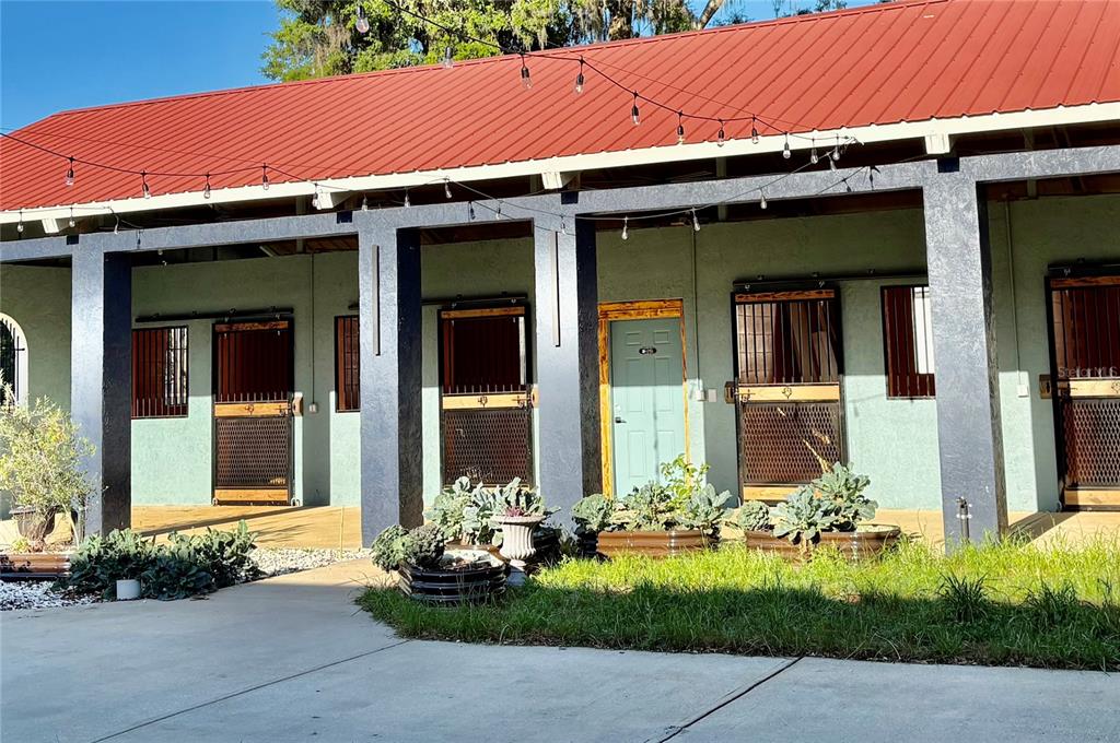 1575 Northeast 100th Street Anthony, FL 32617 - Photo 2 of 45 a front view of a house with an outdoor space