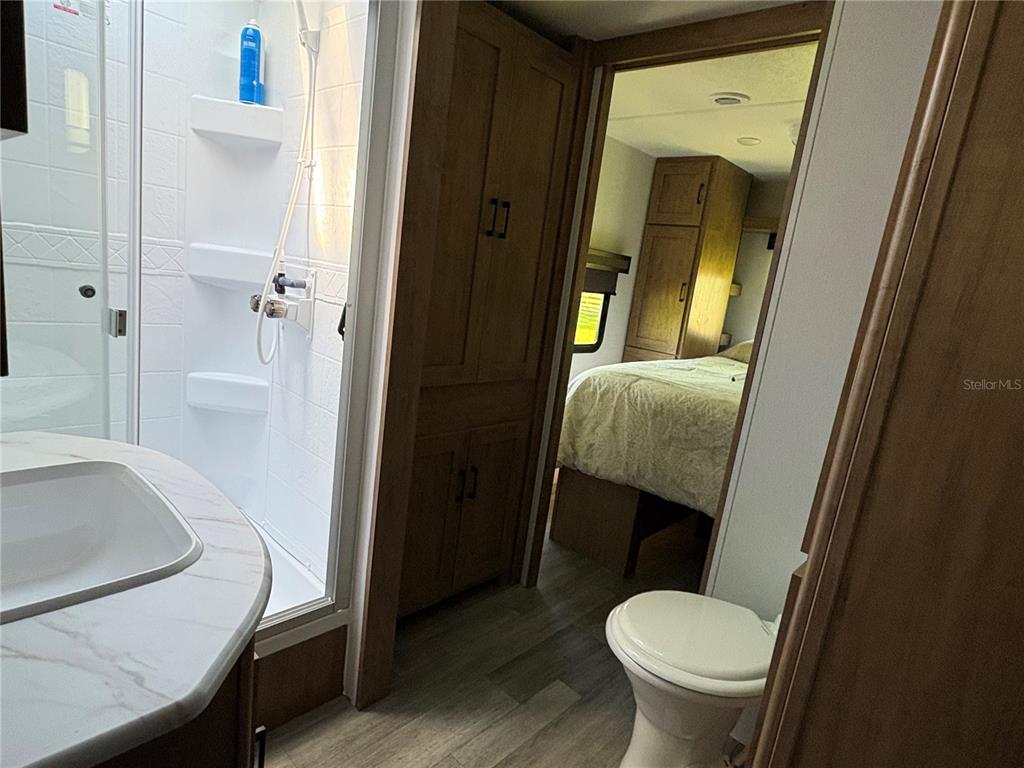 1575 Northeast 100th Street Anthony, FL 32617 - Photo 25 of 29 a bathroom with a sink and toilet