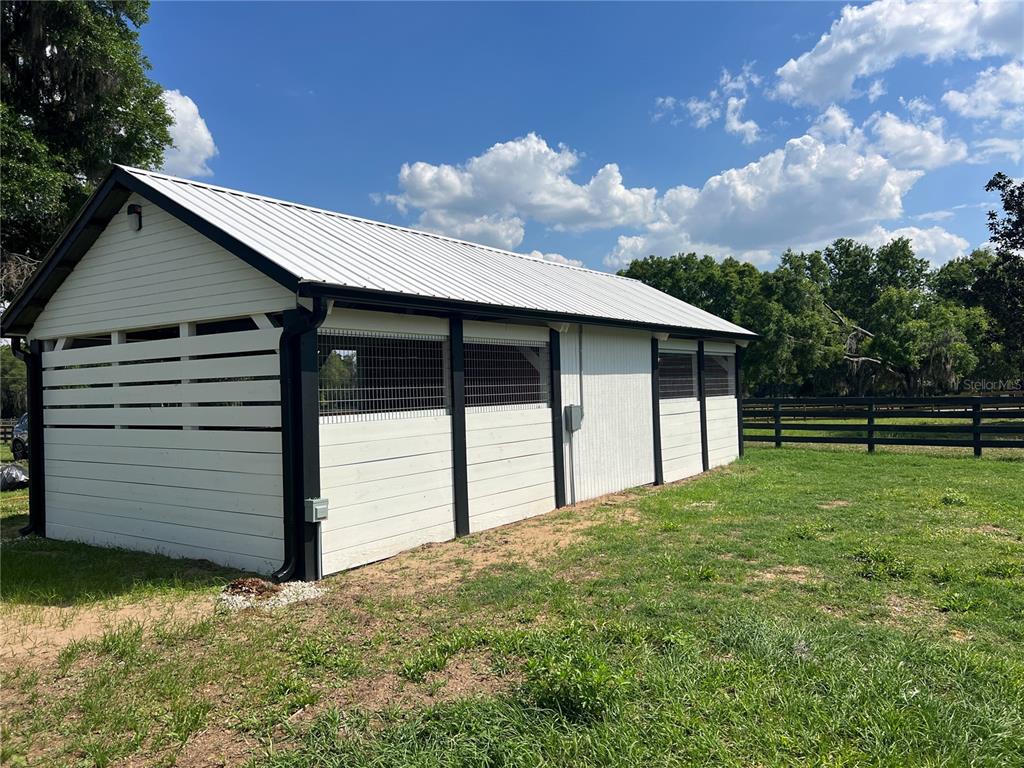 1575 Northeast 100th Street Anthony, FL 32617 - Photo 3 of 29 a view of a house with a backyard