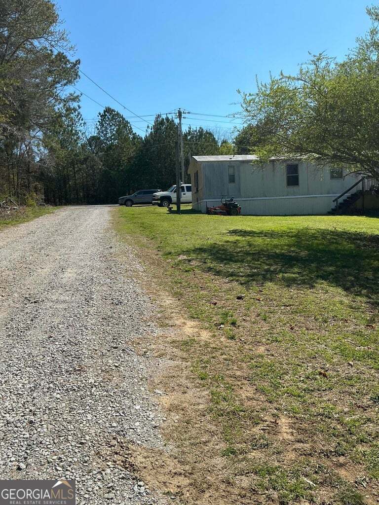 894-896 Wheeler Road, Unit 1 & 2 LaFayette, GA 30728 - Photo 4 of 11 a view of a yard