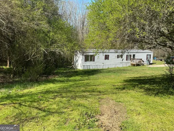 a house view with a swimming pool
