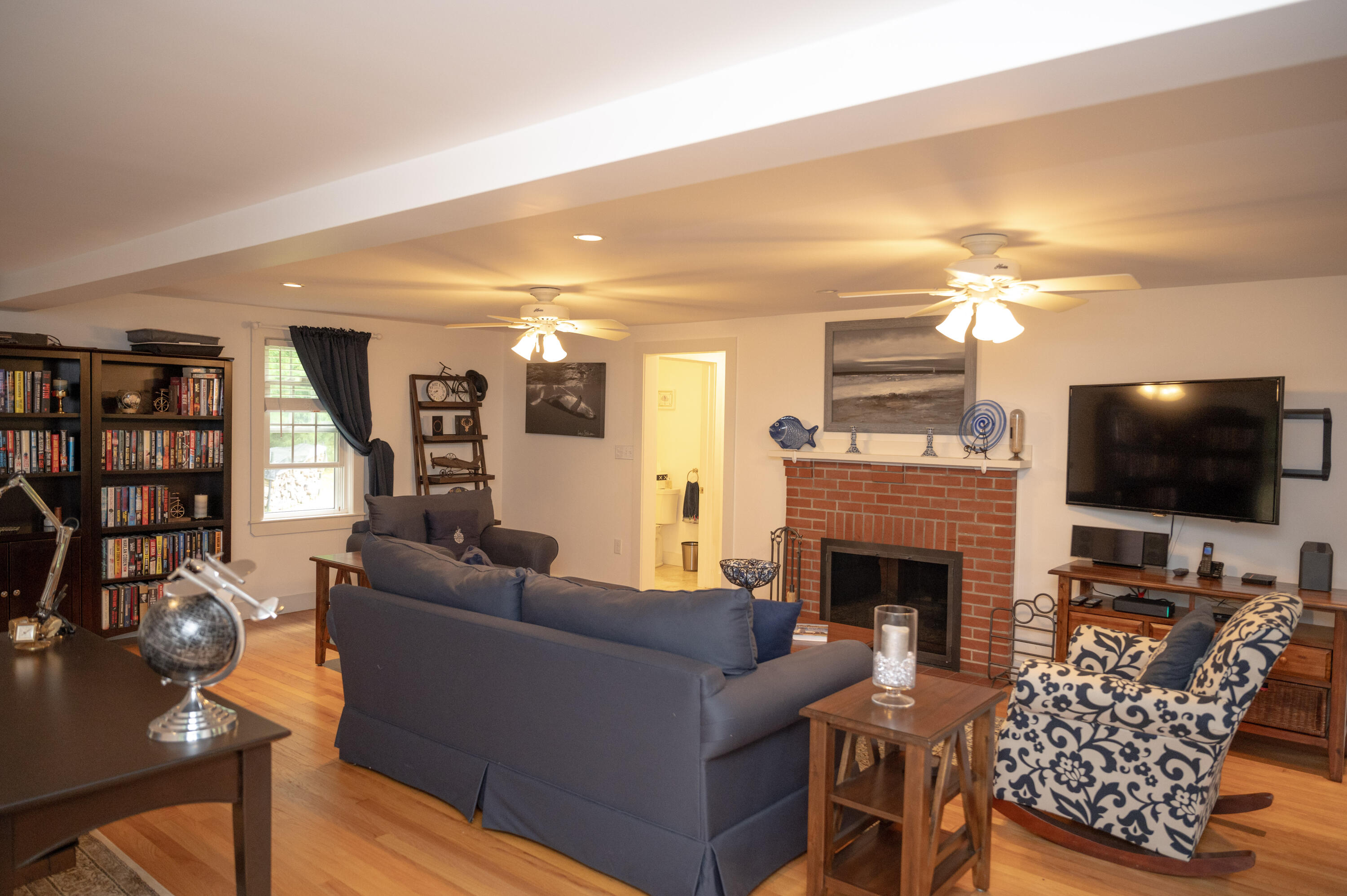 46 Bournedale Road Buzzards Bay, MA 02532 - Photo 13 of 46 a living room with furniture a flat screen tv and a fireplace