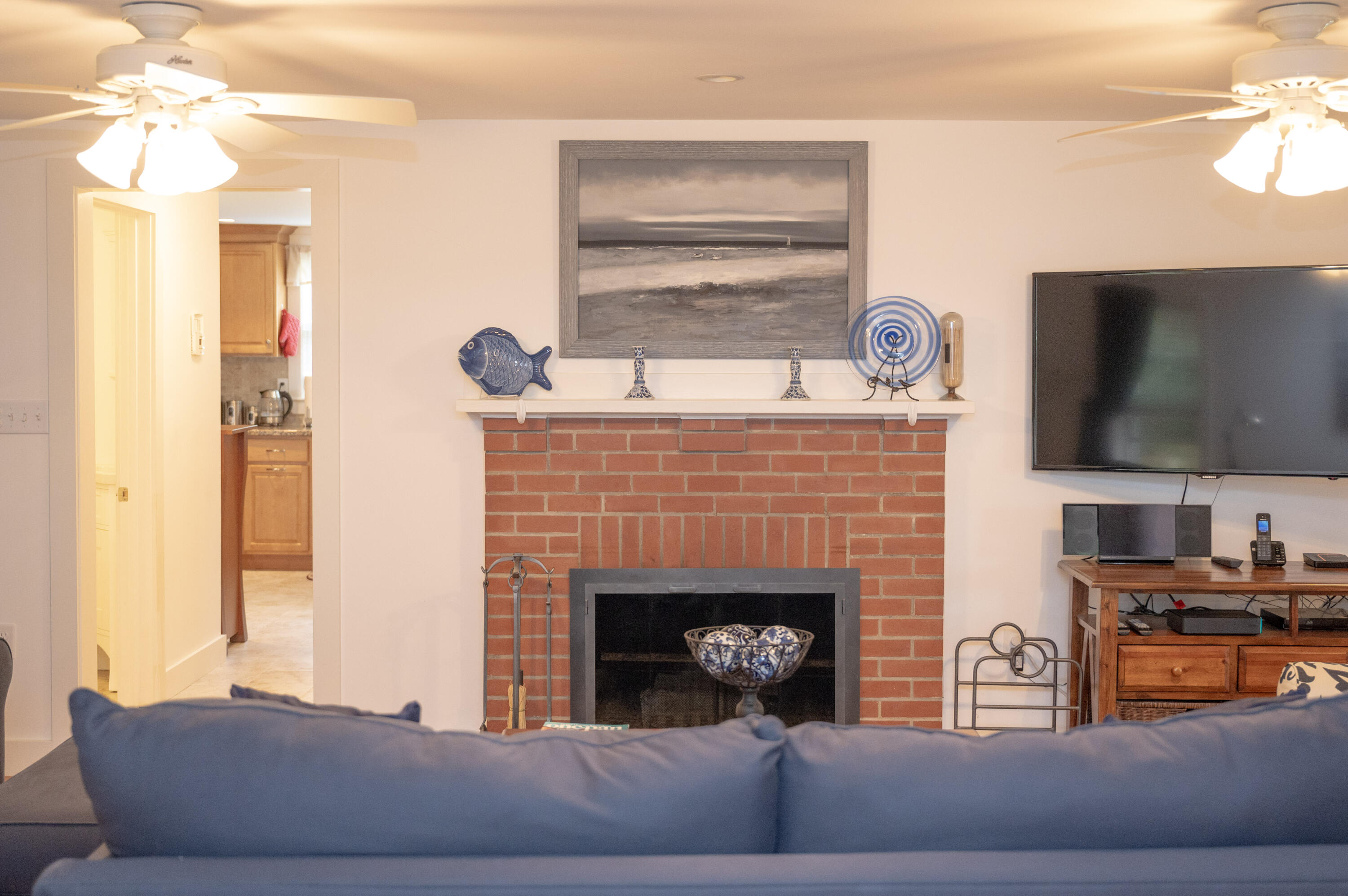46 Bournedale Road Buzzards Bay, MA 02532 - Photo 15 of 46 a living room with furniture a flat screen tv and a fireplace