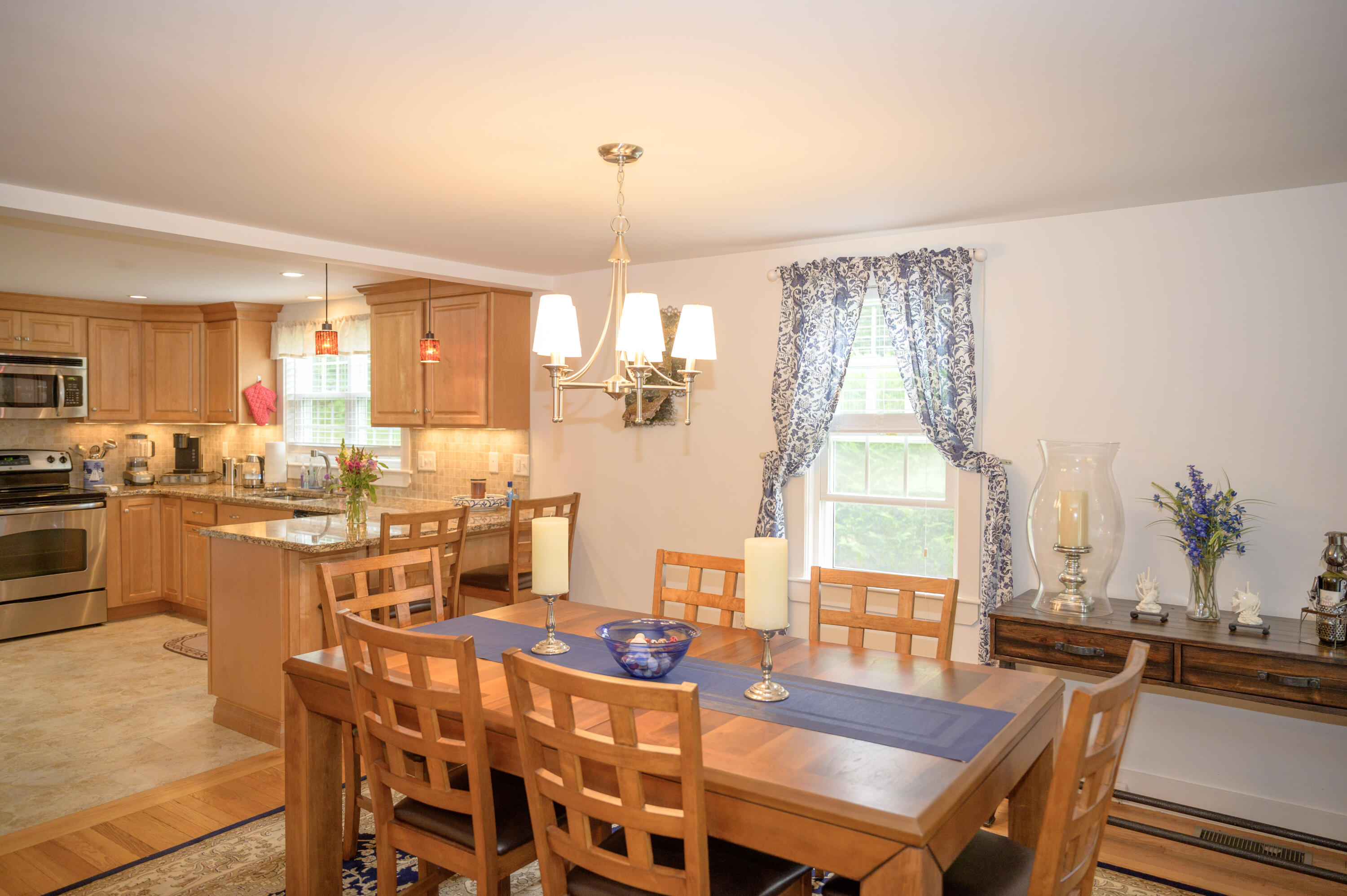46 Bournedale Road Buzzards Bay, MA 02532 - Photo 21 of 46 a view of a dining room with furniture window and wooden floor