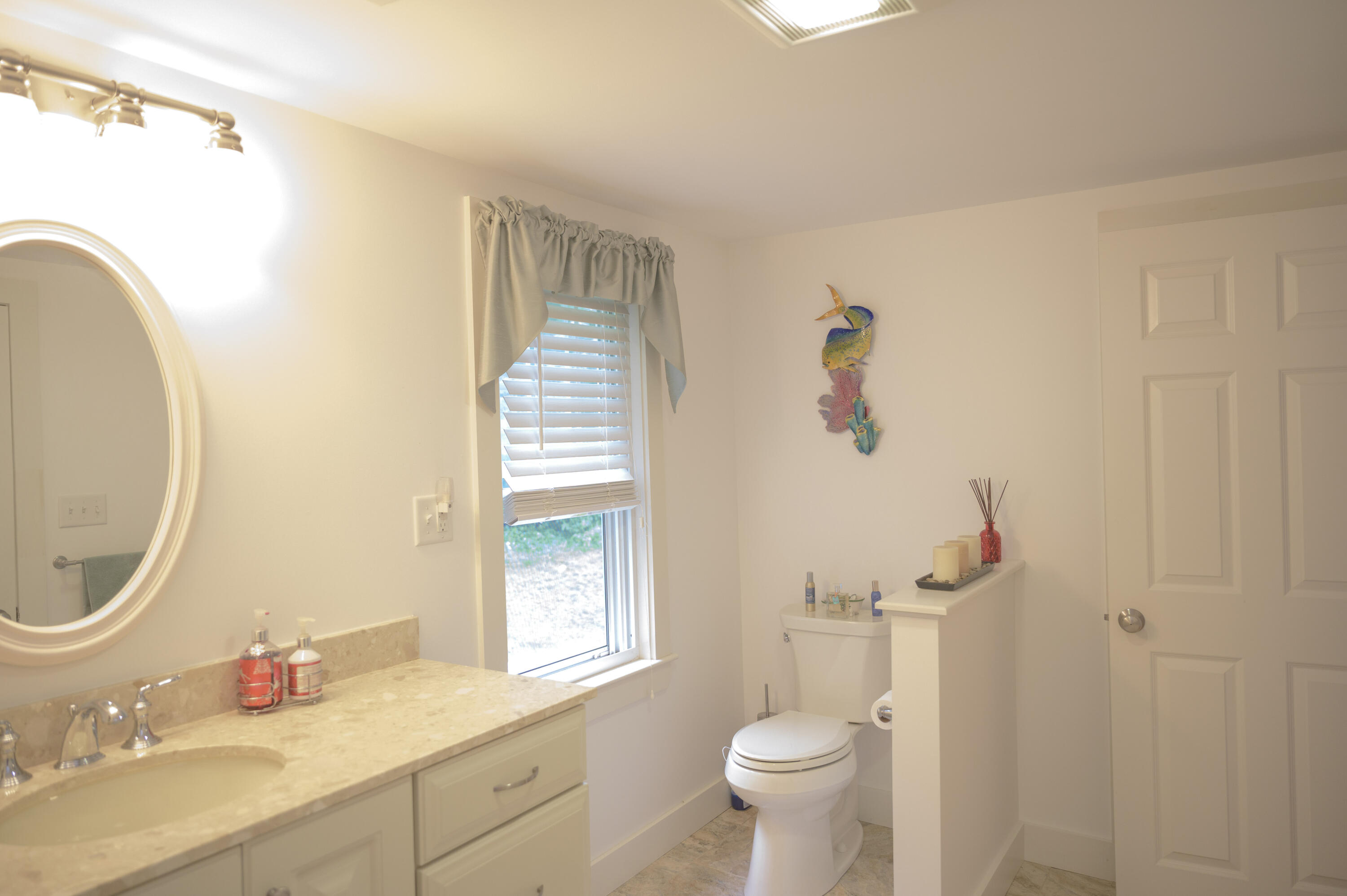 46 Bournedale Road Buzzards Bay, MA 02532 - Photo 28 of 46 a bathroom with a sink and a mirror