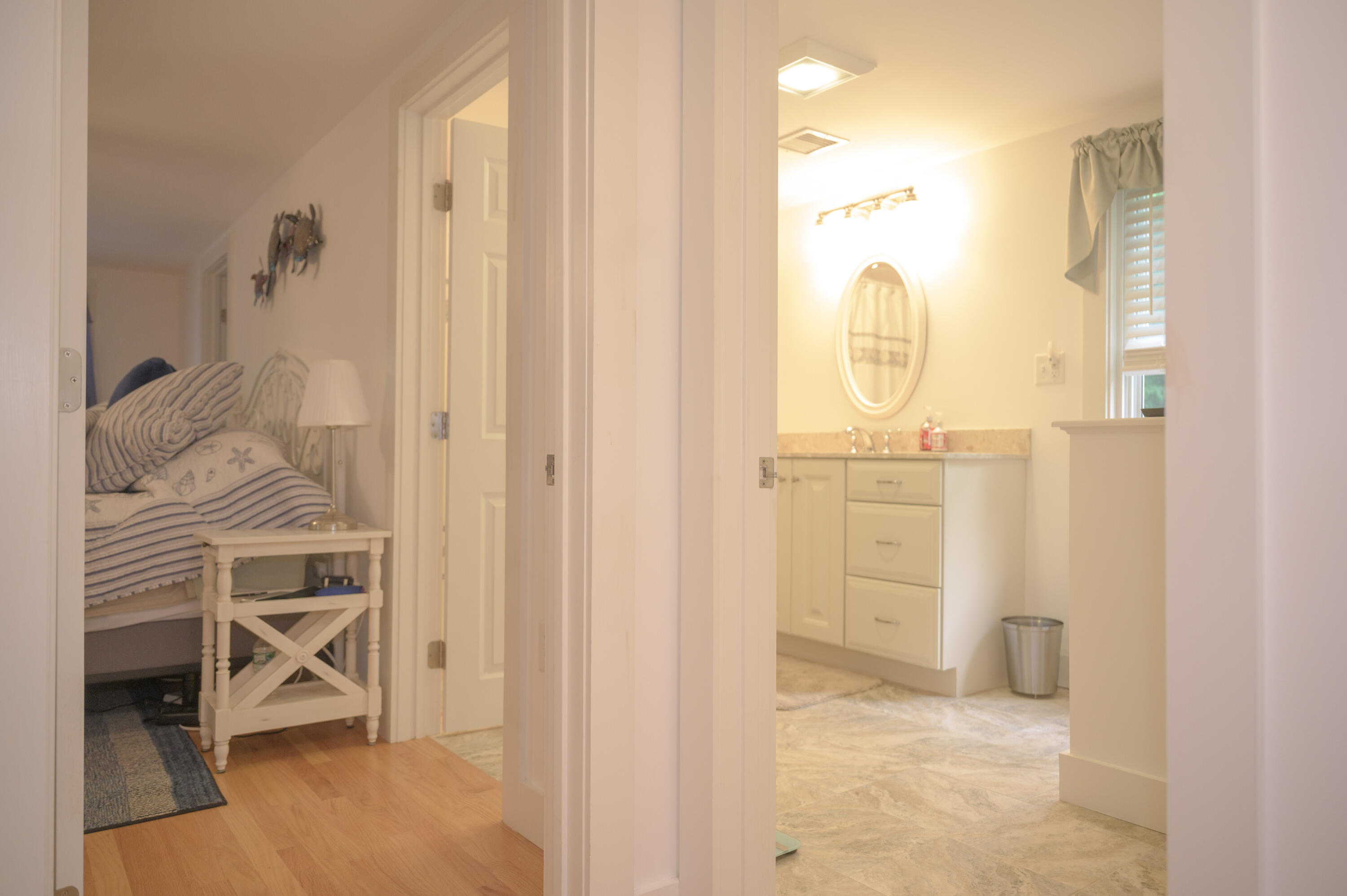 46 Bournedale Road Buzzards Bay, MA 02532 - Photo 29 of 46 a view of a livingroom with table and chair and floor to ceiling window