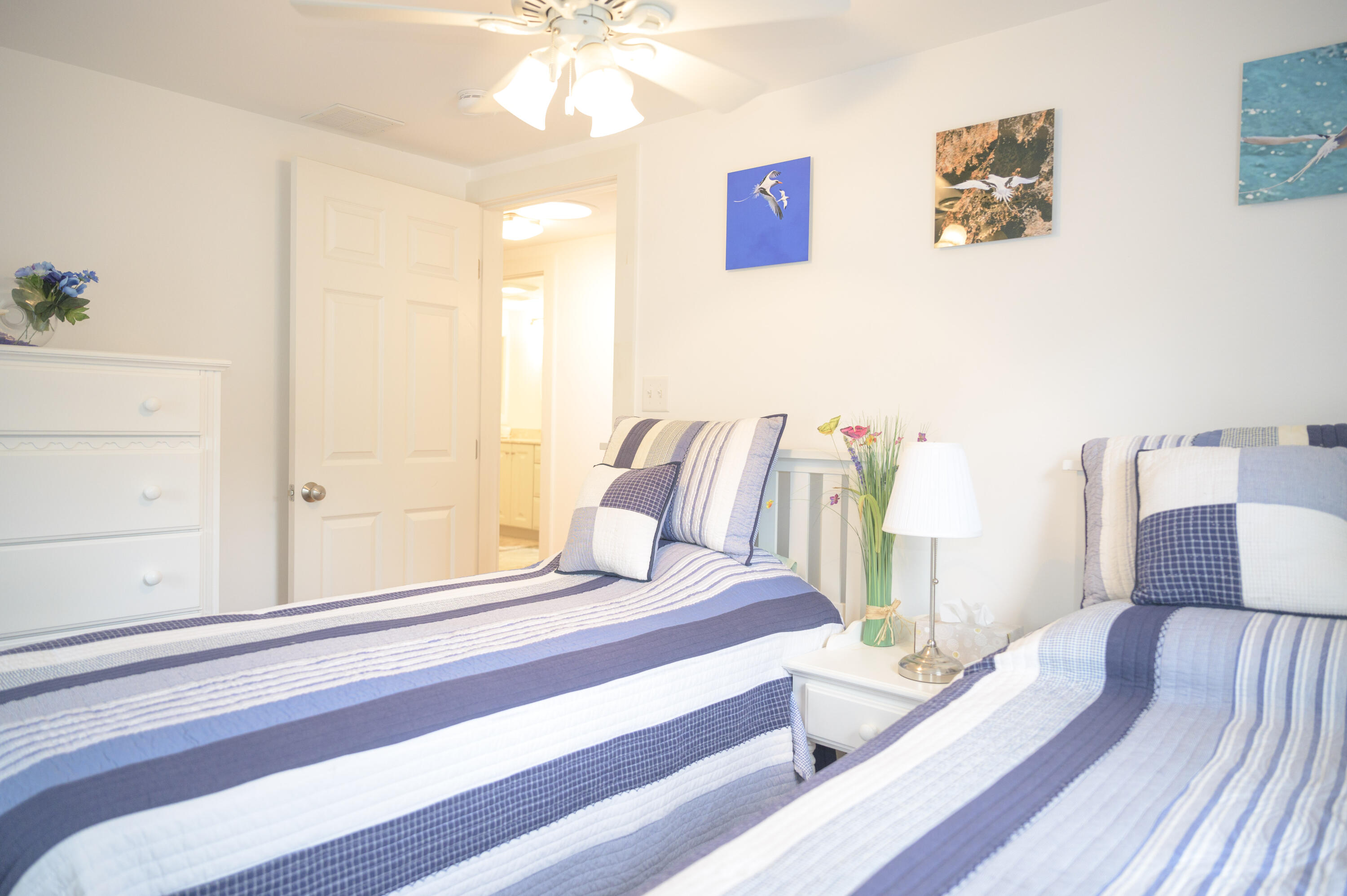 46 Bournedale Road Buzzards Bay, MA 02532 - Photo 33 of 46 a bedroom with furniture and a chandelier