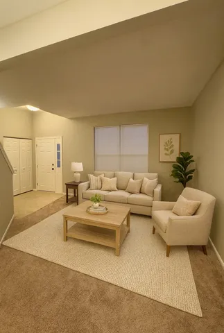 a living room with furniture and a couch