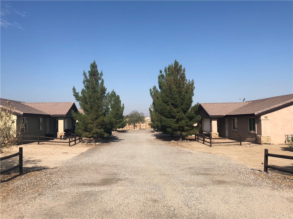 11612 Oasis Road, Unit A Pinon Hills, CA 92372 - Photo 1 of 1 a view of a house with snow on the road