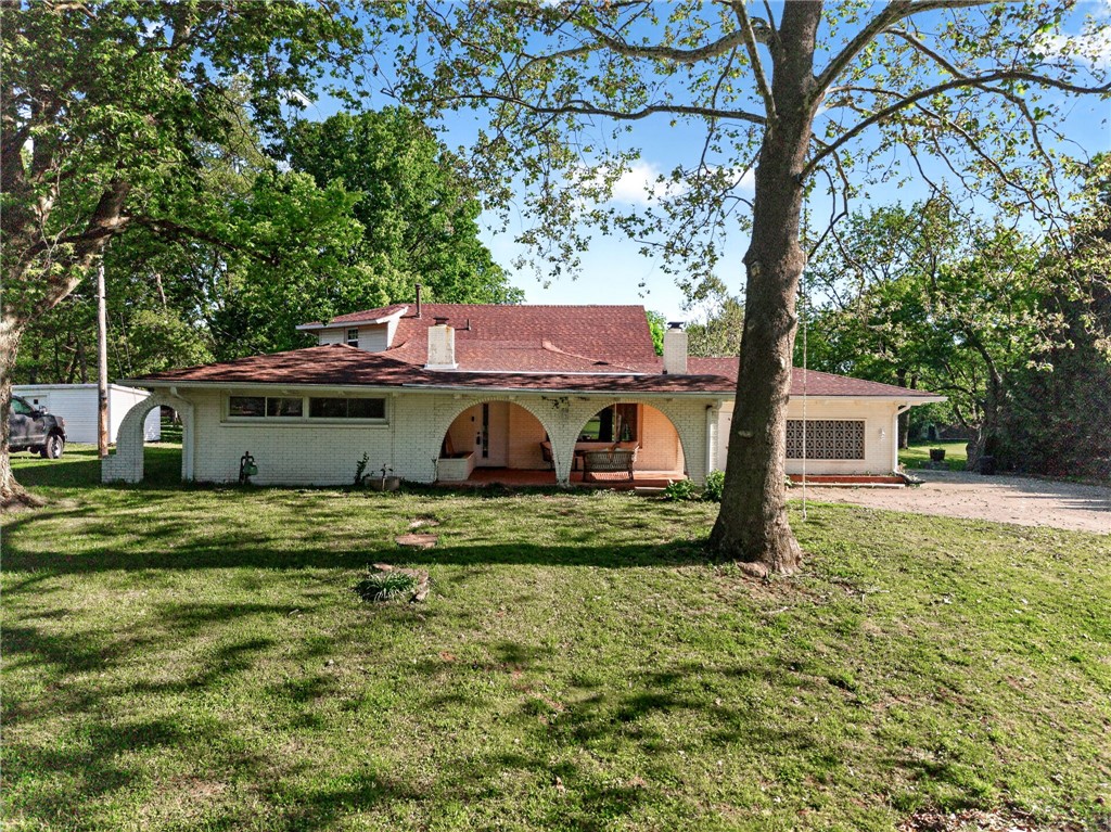 2684 Arthur Road Springfield, OH 45502 - Photo 58 of 69 This charming home features a classic brick exterior and a welcoming arched front porch.
