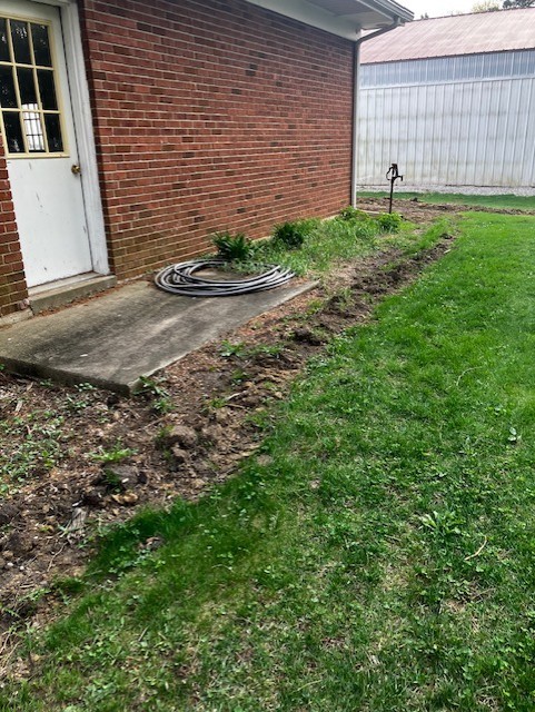 4015 East 1st Road Mendota, IL 61342 - Photo 36 of 45 a backyard of a house with lots of green space and plants