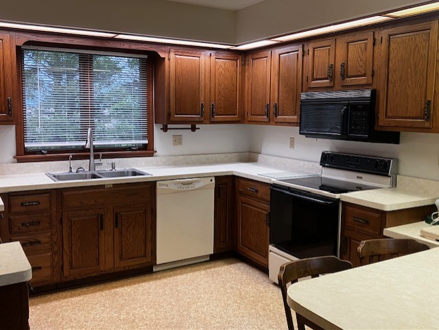 4015 East 1st Road Mendota, IL 61342 - Photo 6 of 45 a kitchen with a sink cabinets and stainless steel appliances