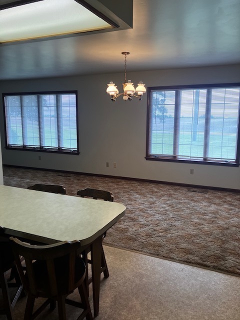 4015 East 1st Road Mendota, IL 61342 - Photo 7 of 45 a view of a room with a table and chairs