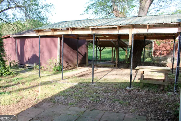 a backyard of a house with lots of green space