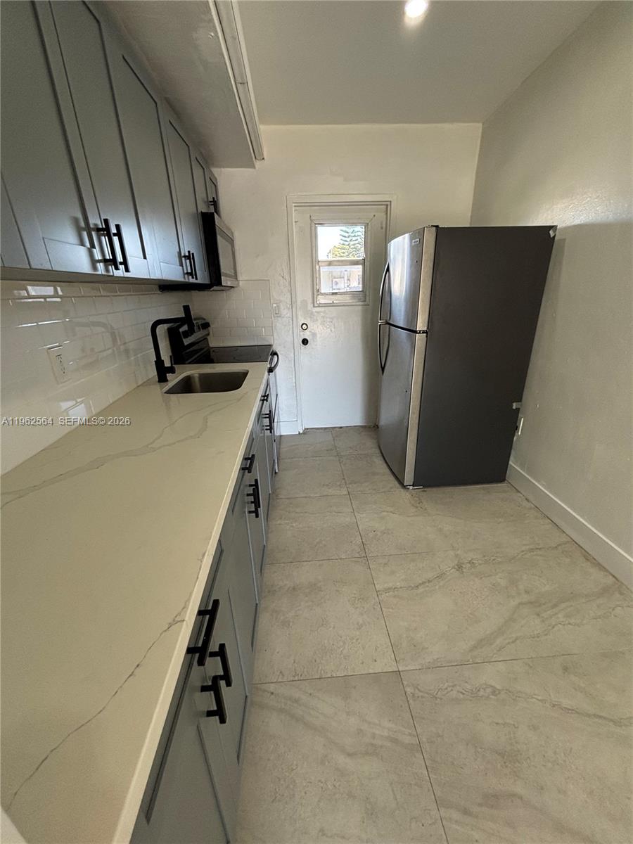 1821 Northwest 74th Street Miami, FL 33147 - Photo 11 of 25