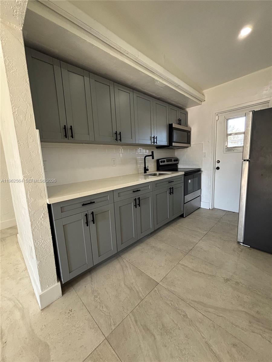 1821 Northwest 74th Street Miami, FL 33147 - Photo 10 of 25
