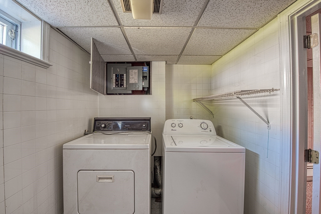 31 Rindone Street Holbrook, MA 02343 - Photo 11 of 23 a utility room with dryer and washer