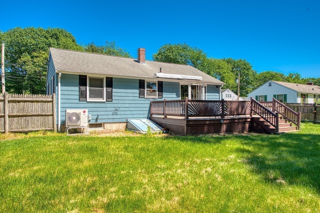 31 Rindone Street Holbrook, MA 02343 - Photo 19 of 23 a view of a house with a yard and sitting area