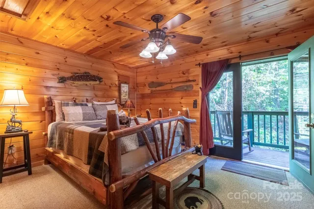 a living room with furniture a ceiling fan and a window
