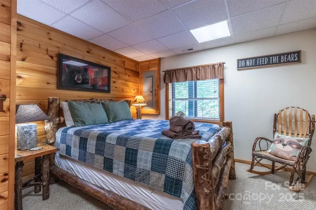 a bedroom with furniture and windows