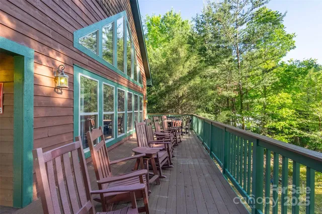 a view of balcony with furniture