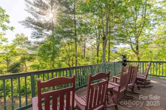 a view of a two chairs in the deck