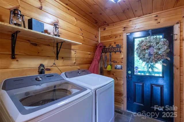 a utility room with dryer and washer