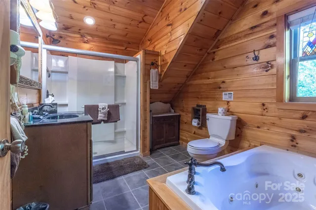 a living room with furniture a rug and a fireplace