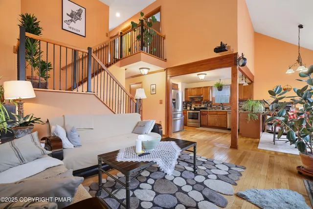 a view of a patio with couches table and chairs