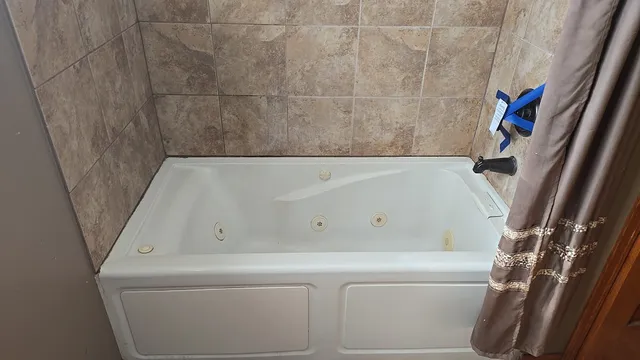 a bathroom with a bathtub