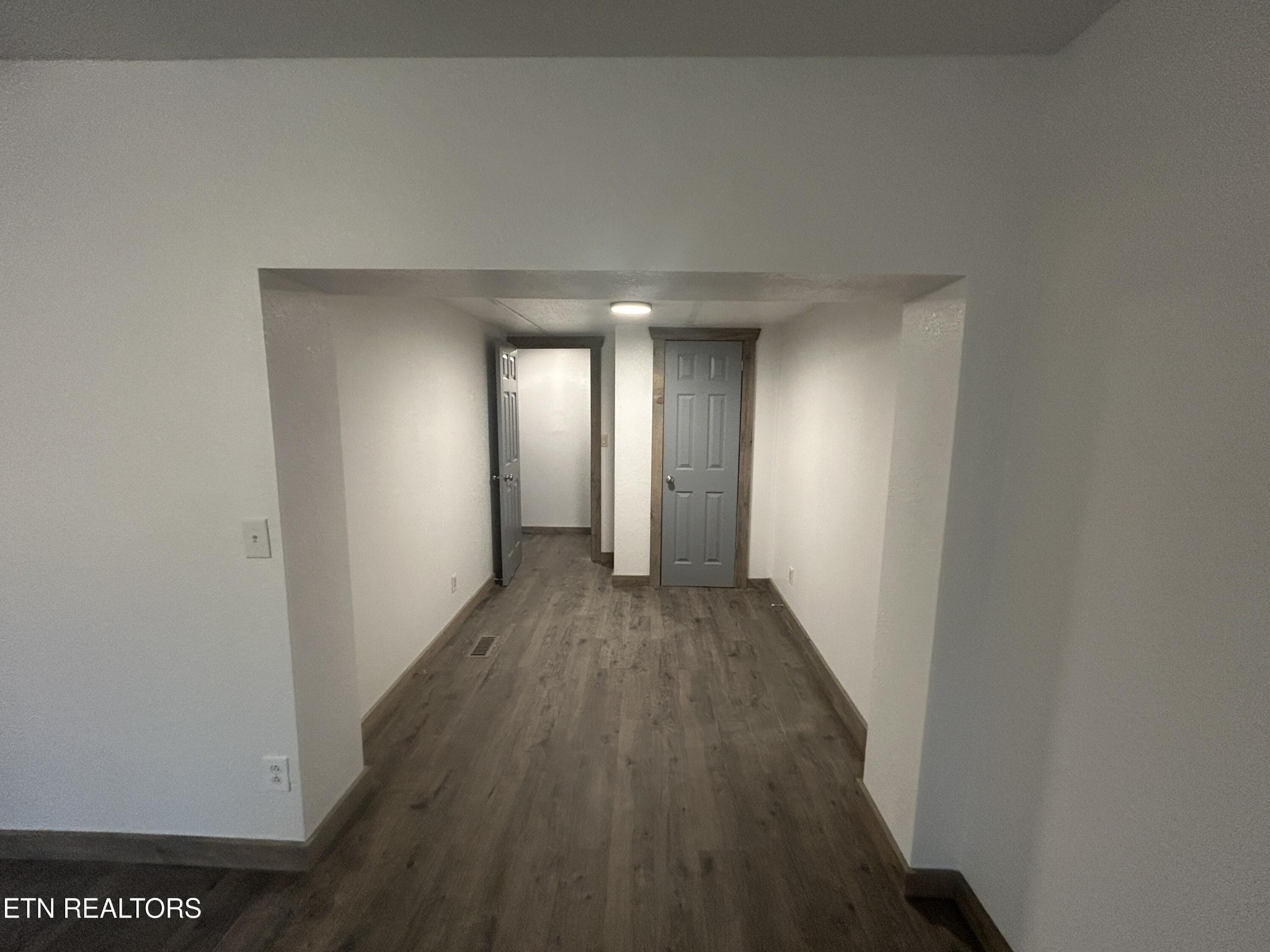 994 Pioneer Road Grimsley, TN 38565 - Photo 18 of 20 a view of a hallway with wooden floor