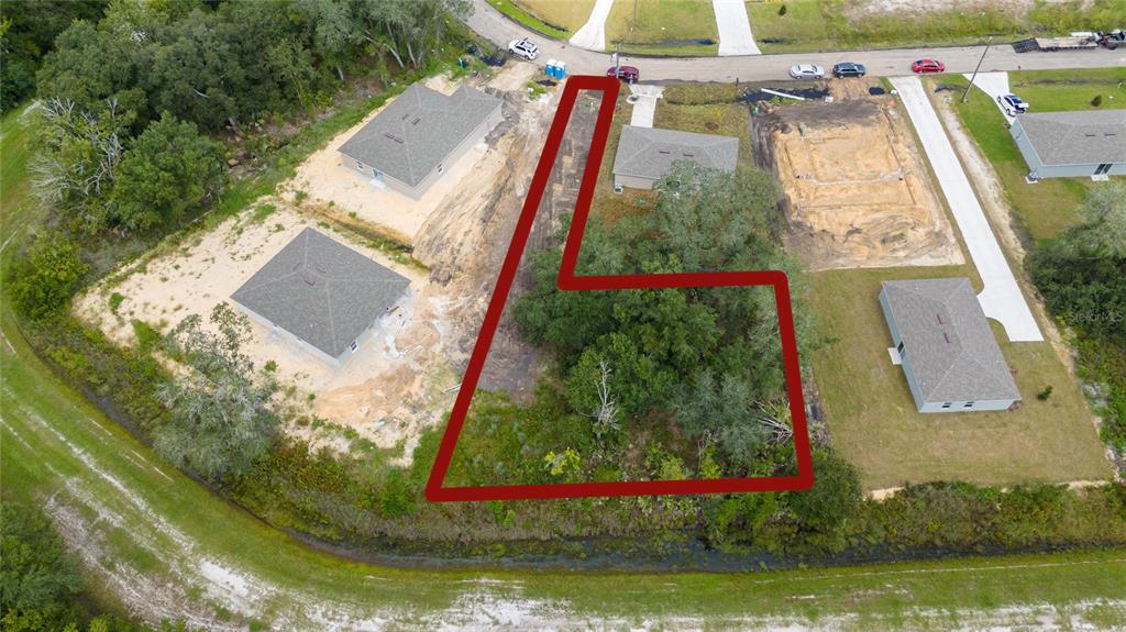 133 Sparrow Court Kissimmee, FL 34759 - Photo 5 of 8 an aerial view of residential houses with outdoor space