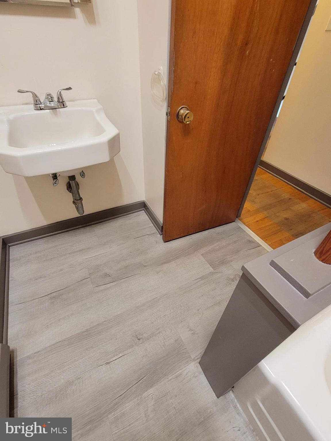 40 Star Road Hereford, PA 18056 - Photo 18 of 20 a bathroom with a sink and a mirror